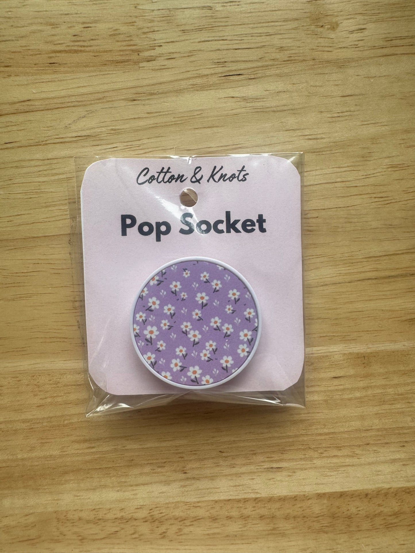 Phone pop sockets
